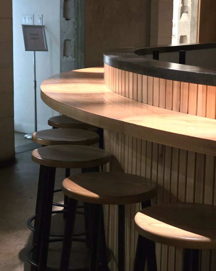 Illustrative image: an empty cafe counter in morning light